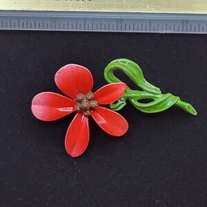 Vintage 60s Era enameled red daisy brooch with green stem